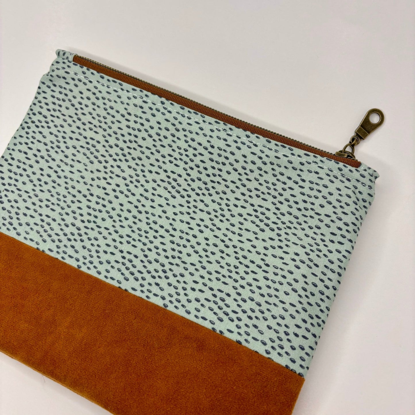 Minty Blue Bag with Navy spots and suede bottom, brass zipper - KLC by Karelyn D