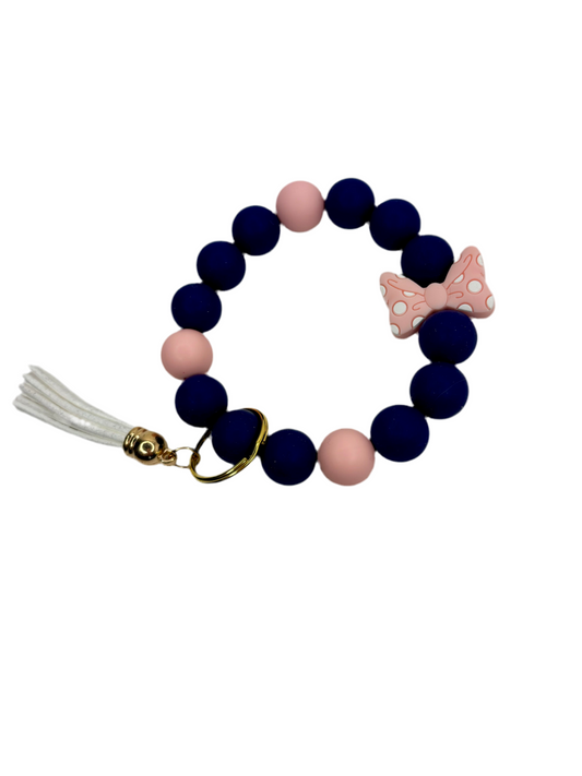 Silicone Beaded Wristlet, Bow Focal Bead, Pink and navy wristlet with white tassel