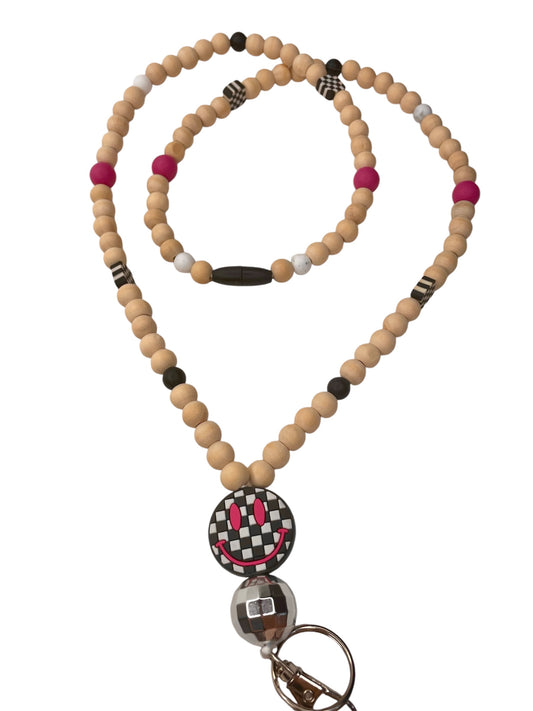 Wooden beaded lanyard with checkered happy face focal bead and breakaway clasp